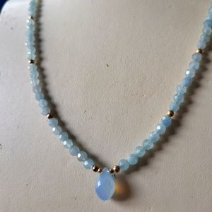 Pear shaped pendant light blue stone necklace